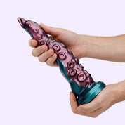 BEISAR Fyrex Octopus Fantasy Dildo shown in hand for size and design reference