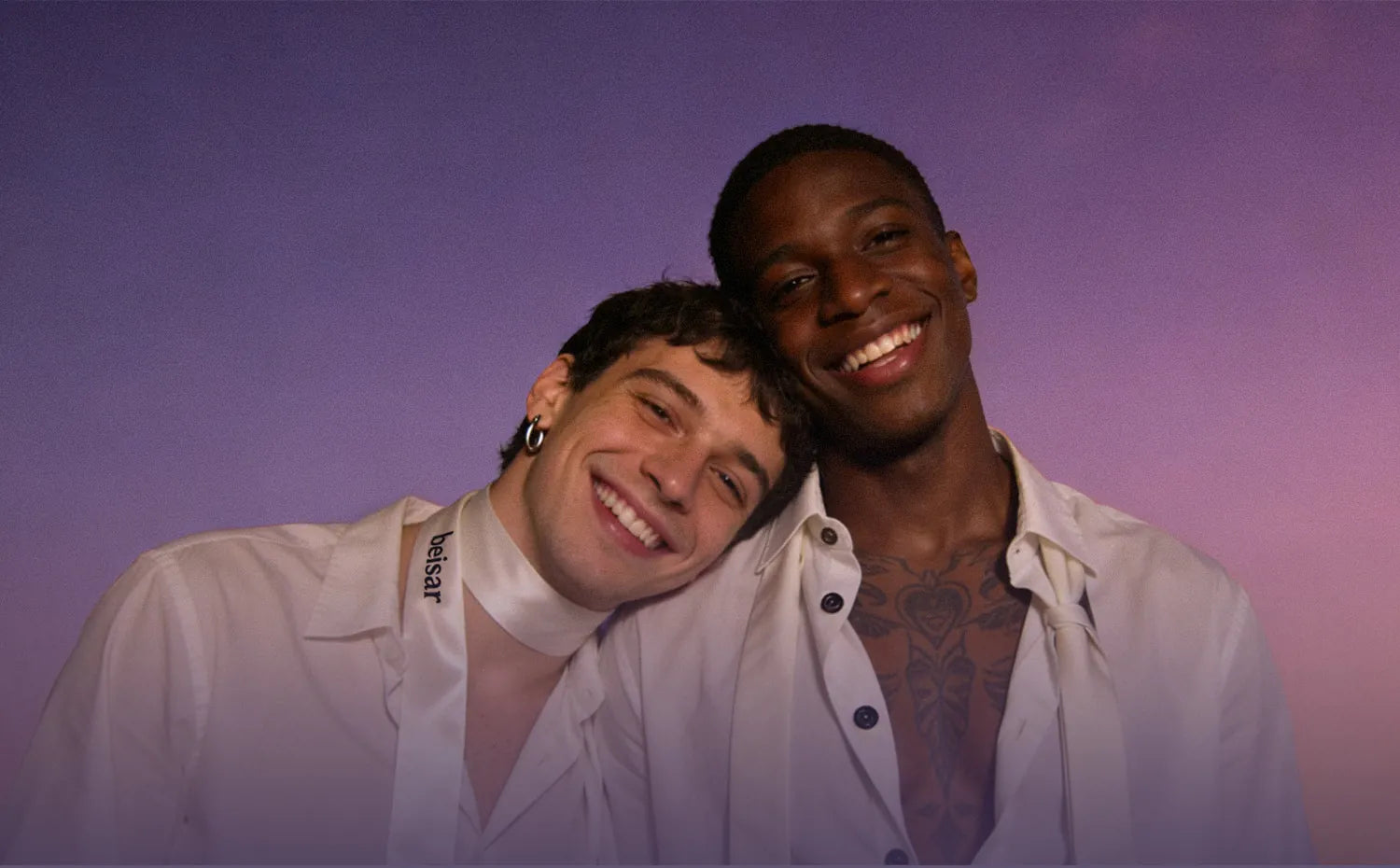 Two community members celebrating identity, connection, and self-expression with BEISAR