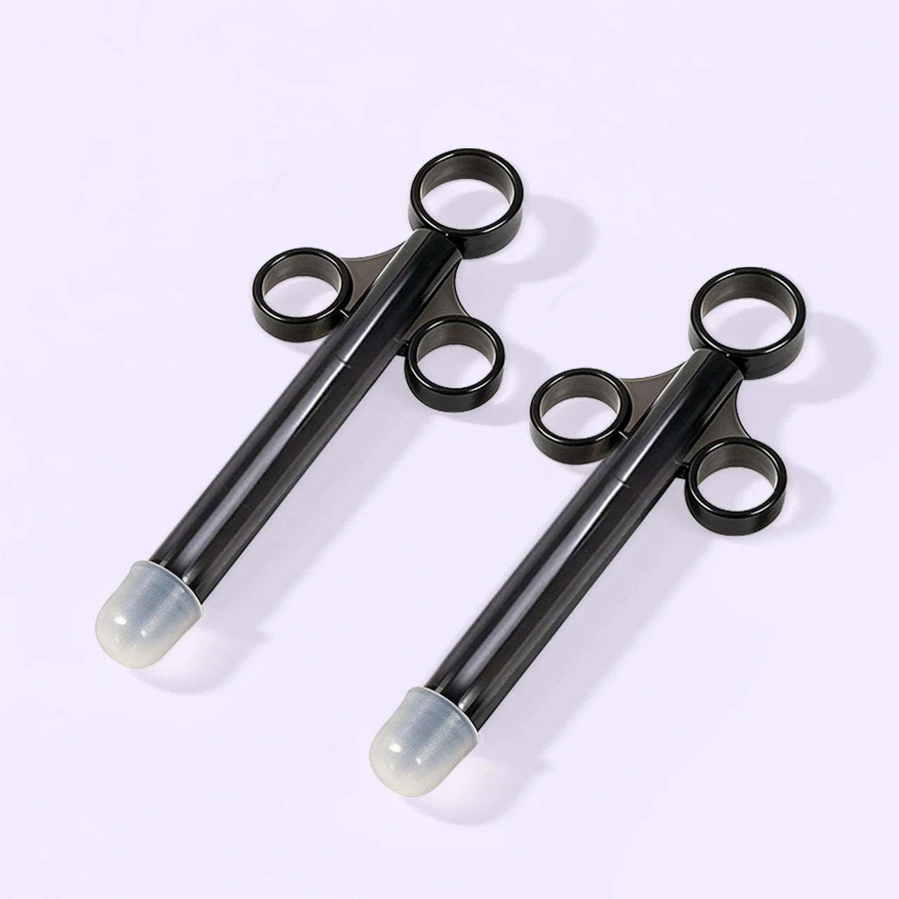 Two BEISAR Prelude silicone lube applicators displayed at a 45-degree angle